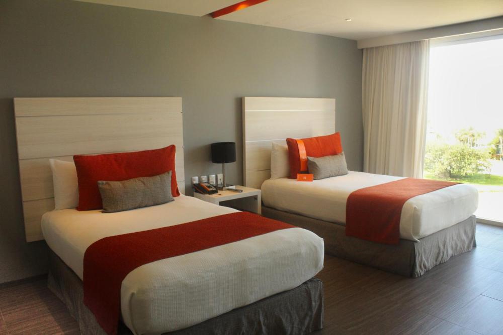 Deluxe Two Beds - Lagoon View at Real Inn Cancun, photo 2